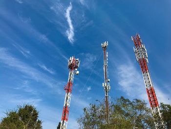 Low angle view of communications tower against sky