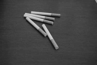 High angle view of cigarette on table