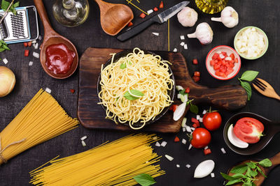 Spaghetti on a ready-to-eat plate, top view.