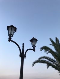 Low angle view of street light against clear sky