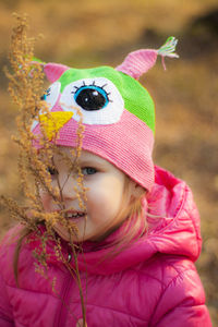 Portrait of cute girl wearing hat