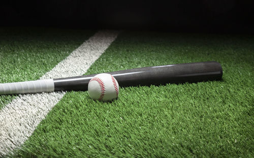 High angle view of baseball on grass