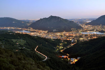 High angle view of illuminated buildings in city against sky