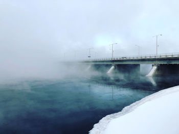 Scenic view of the ottawa river against sky during winter. 