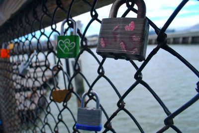Love padlock tradition on bridge railing
