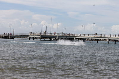 Pier on sea against sky