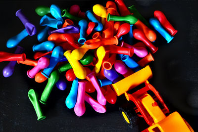 High angle view of multi colored candies on table