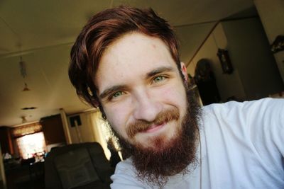 Portrait of smiling woman at home