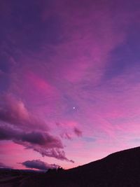 Low angle view of dramatic sky during sunset