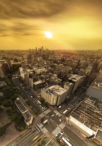 High angle view of cityscape against sky during sunset