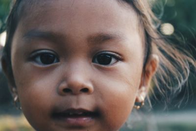 Close-up portrait of cute girl