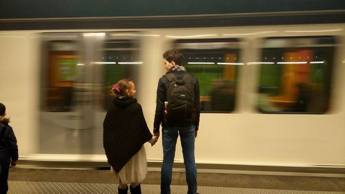 Blurred motion of train at railroad station