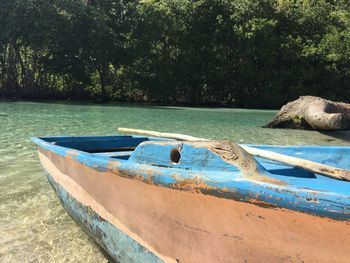 Boats moored in a lake