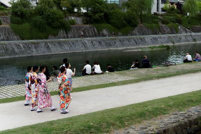 Rear view of woman walking in park