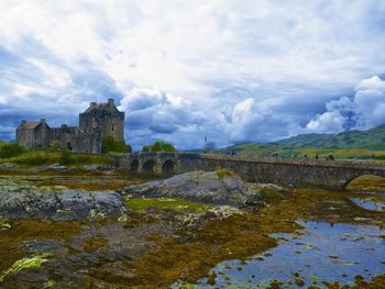 Historic building against cloudy sky