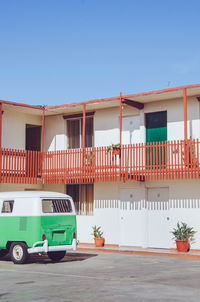 View of built structures against clear blue sky