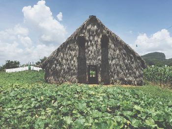 Built structure against cloudy sky