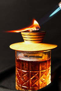 Close-up of illuminated candle
