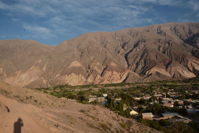 Scenic view of landscape and mountains against sky