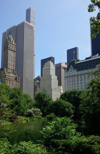 Modern buildings against sky in city