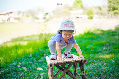 Full length of boy on field