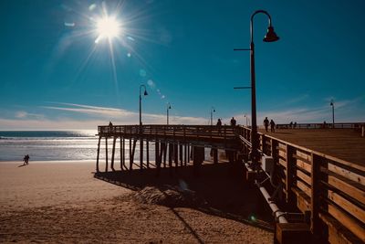 Street by sea against sky