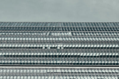 Low angle view of modern building against sky