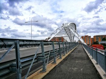 Bridge against sky in city