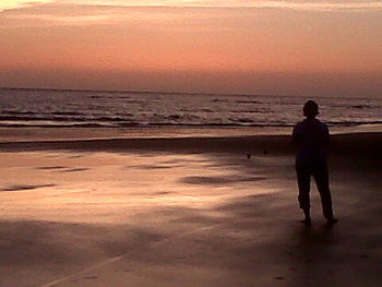 Scenic view of sea at sunset