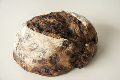 High angle view of bread against white background