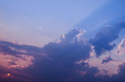 Low angle view of clouds in sky during sunset