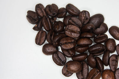 Close-up of coffee beans on table