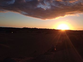 Scenic view of sunset over landscape