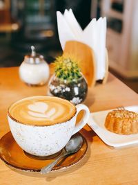 Close-up of coffee cup on table