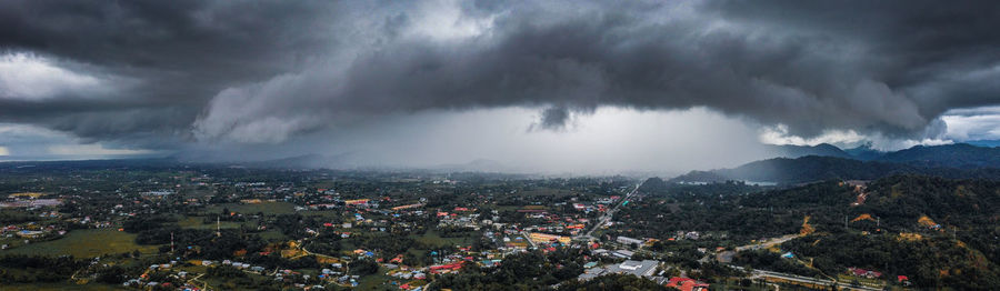 Aerial view of townscape against sky