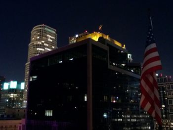 Low angle view of illuminated building at night