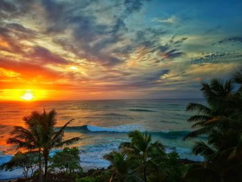 Scenic view of sea against sky during sunset