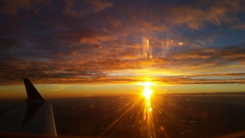 Scenic view of dramatic sky at sunset