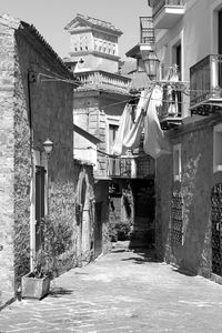 Alley amidst buildings in city