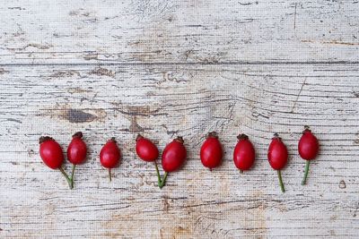 High angle view of red berries on table