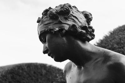 Close-up of statue against sky