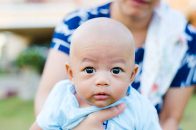 Close-up portrait of cute boy 