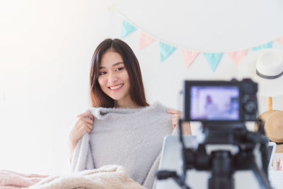 Portrait of a smiling young woman