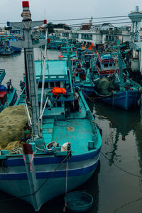 High angle view of fishing boats moored on sea