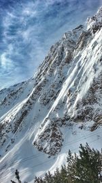 Scenic view of snow covered mountains