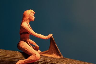 Close-up of statue against clear sky