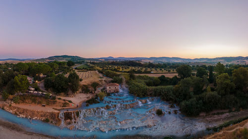 Scenic view of landscape against sky during sunset