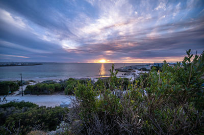 Scenic view of sea against sky during sunset