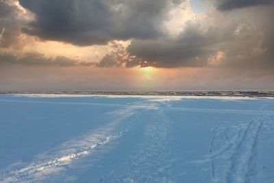 Scenic view of sea against sky during sunset