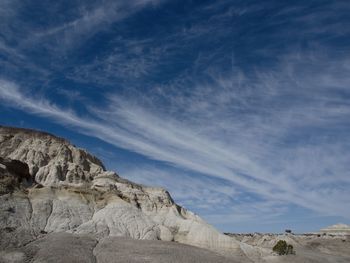 Rock formations in desert against sky